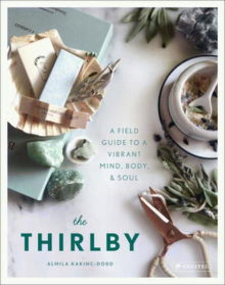 Hardback book "The Thirlby" by Almila Kakinc-Dodd on holistic living, featuring self-care tips, recipes, and spiritual guidance.