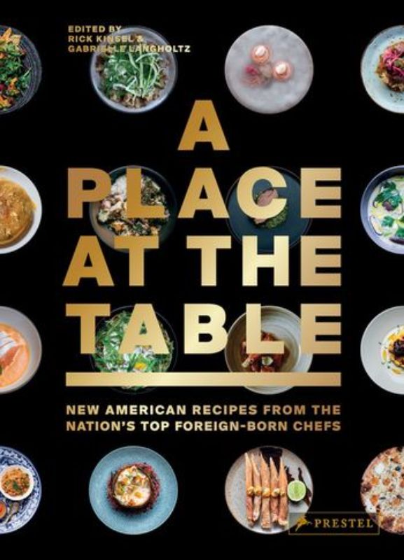 Hardback cookbook featuring signature dishes from 40 renowned foreign-born chefs transforming American cuisine.