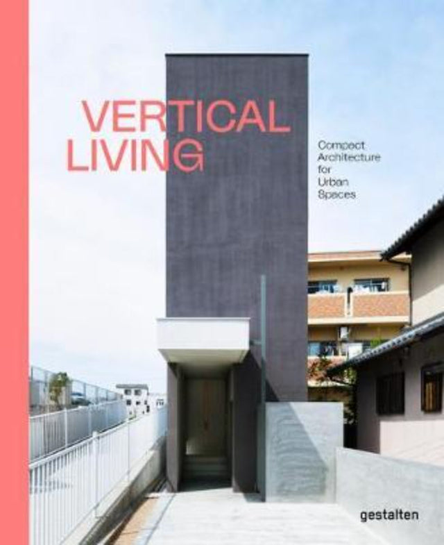 Hardback book titled "Vertical Living," showcasing innovative urban architecture and stylish small-space design solutions.