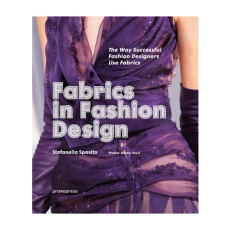 Hardcover guide "Fabrics in Fashion Design" featuring 1,600 color photos, exploring fabric types and their creative applications.