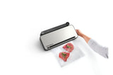 FoodSaver Controlled Multi Seal by Sunbeam: sleek stainless steel vacuum sealer with versatile settings and accessory hose for food preservation.