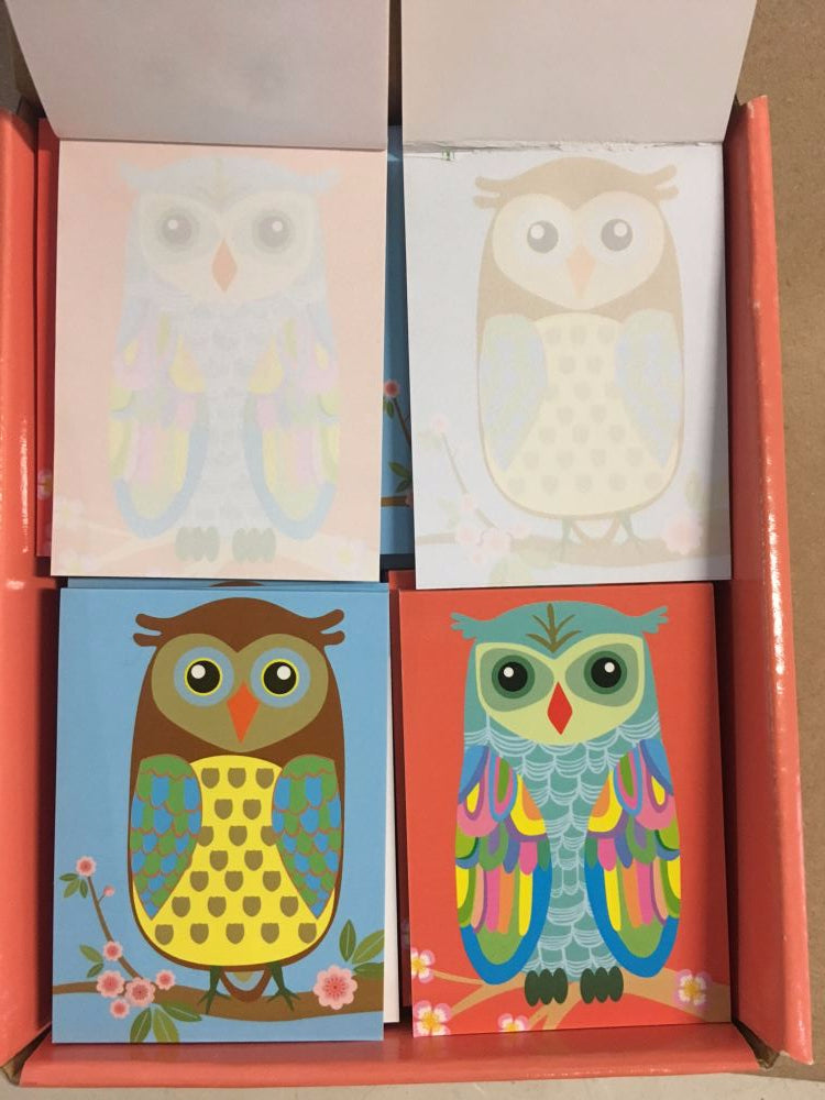 Set of 4 whimsical owl mini notebooks, each 6 x 8.5 cm, perfect for notes and sketching with subtle watermarked pages.