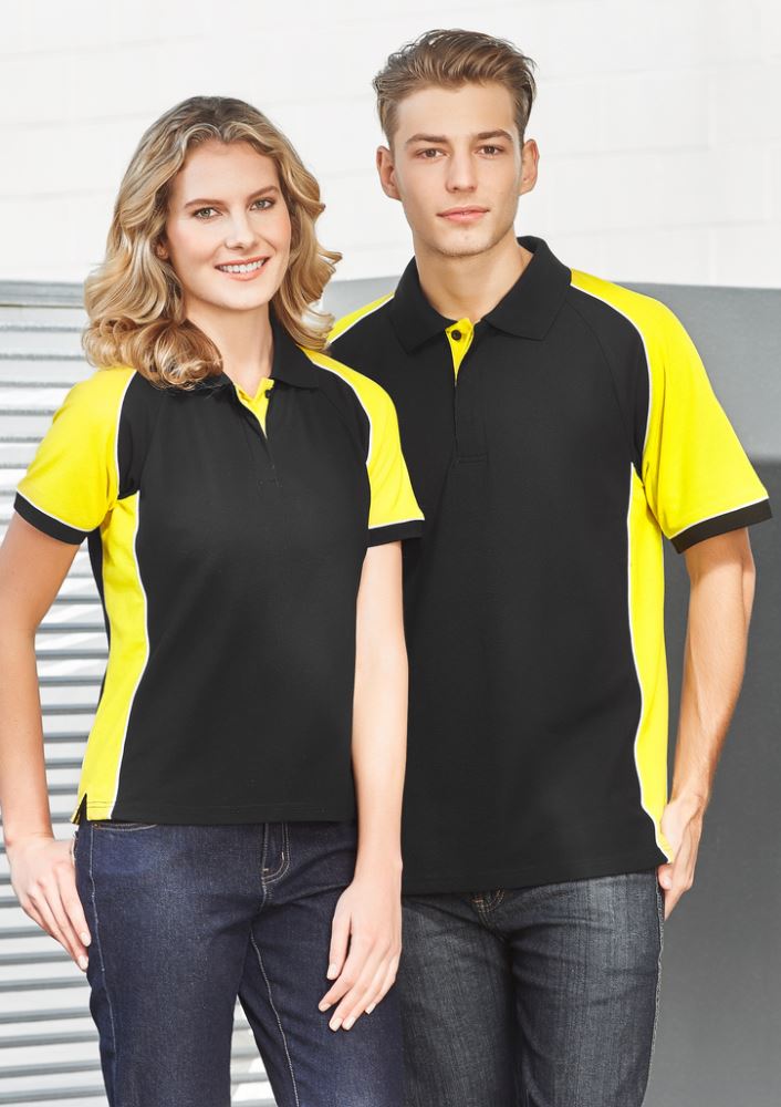 Men's Nitro Polo in Black, Orange, and White, size XL, featuring soft pique knit, contrast panel, and practical pocket.