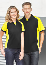Men's Nitro Polo in Black, Orange, and White, size XL, featuring soft pique knit, contrast panel, and practical pocket.