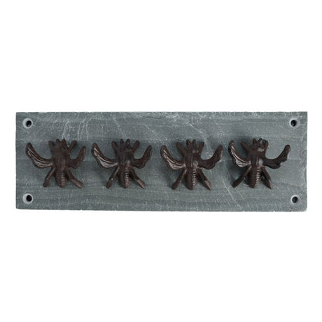 4 Hook Hanger set featuring a decorative bee design with robust hooks on a slate backdrop, perfect for home organization.