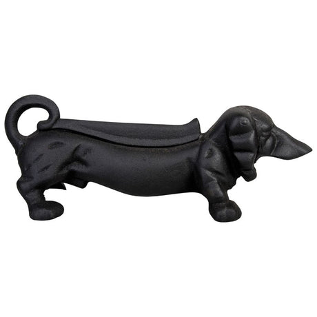 Black dachshund-shaped boot scraper, 32cm long, crafted from durable cast iron for effective mud removal and stylish entryway decor.