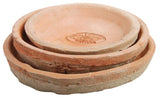 Handcrafted terracotta saucers, 14x14x2cm, ideal for catching excess water beneath medium-sized pots, with rustic Tuscan charm.