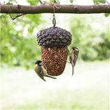 Stylish acorn-shaped bird feeder made of durable PVC and iron, perfect for attracting various birds with nuts or peanuts.