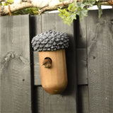 Acorn-shaped birdhouse made from FSC certified wood, perfect for nesting and sheltering birds in your garden.