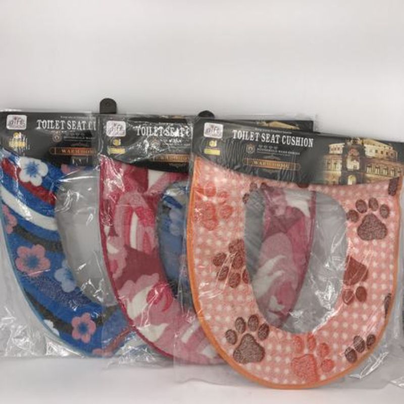 Vibrant set of 12 assorted toilet seat covers in unique designs, ideal for enhancing bathroom decor and hygiene.