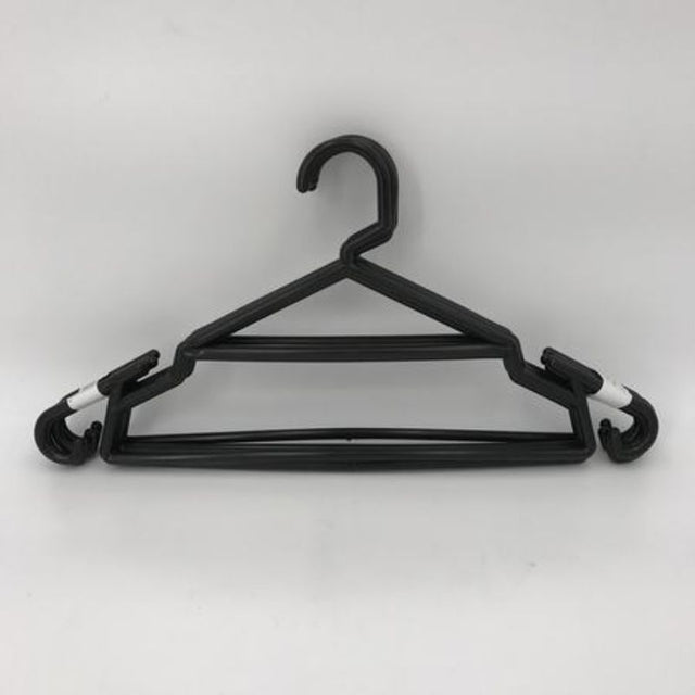 Set of 60 black clothing hangers designed for durability, non-slip grip, and elegant closet organization.