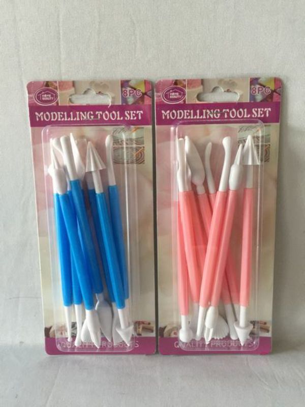 A versatile 12-piece cake modelling tool set for creating detailed decorations with fondant and gum paste.