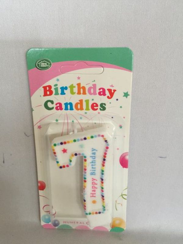 Vibrant eco-friendly birthday candles in a set of 12, perfect for adding a festive touch to any cake.