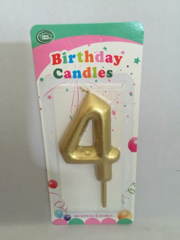Set of 12 elegant gold birthday candles, perfect for adding a luxurious touch to any cake and celebration.