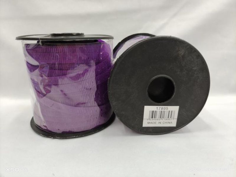 Set of 12 vibrant purple ribbons for crafting, decorating, and gifting, made from soft, durable materials.