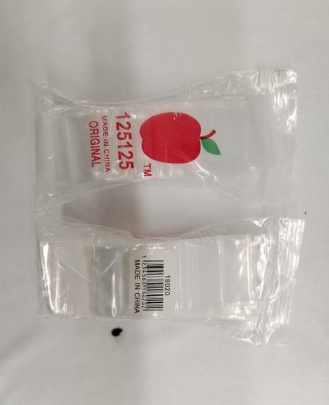 Resealable plastic bags (1200 pcs) for durable storage and organization of food, crafts, and household items.