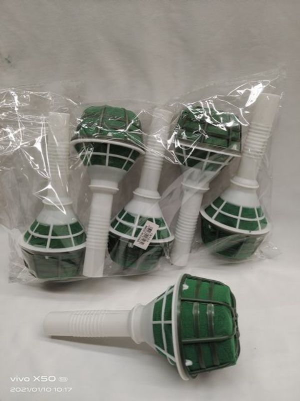 Set of 12 green and white flower stands, perfect for showcasing floral arrangements at home or events.