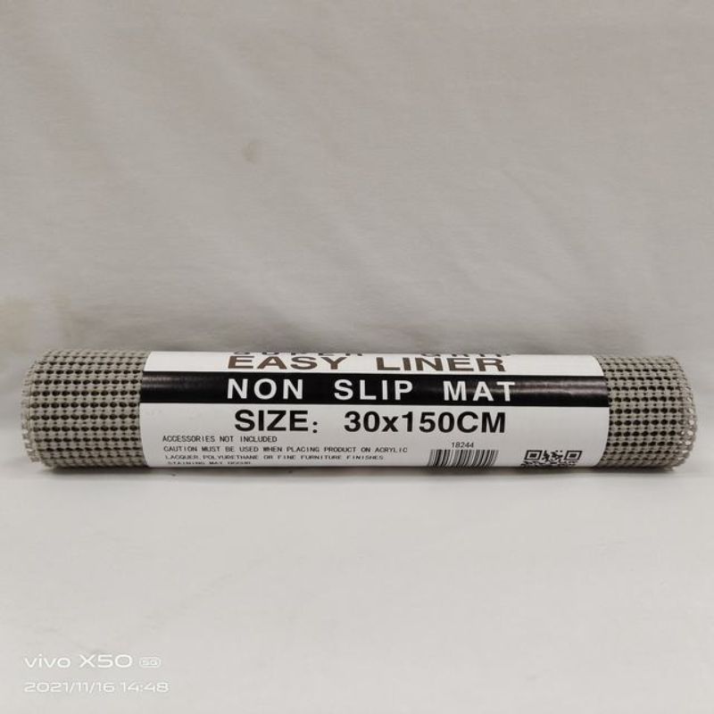 Set of 12 grey non-slip mats (30 x 150cm) designed for safety and style in high-traffic spaces like kitchens and entryways.