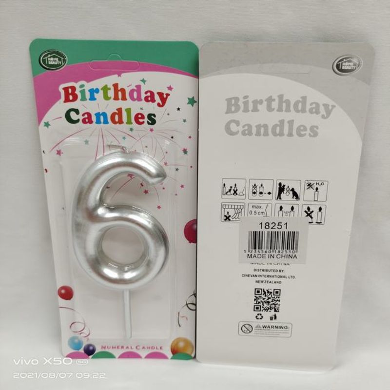 Set of 12 elegant silver birthday candles, perfect for adding glamour to cakes for any celebration or special occasion.