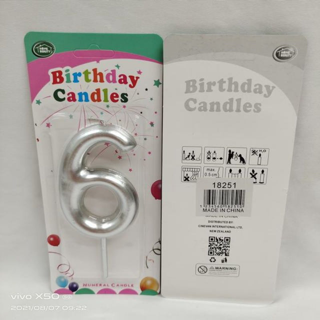 Set of 12 elegant silver birthday candles, perfect for adding glamour to cakes for any celebration or special occasion.