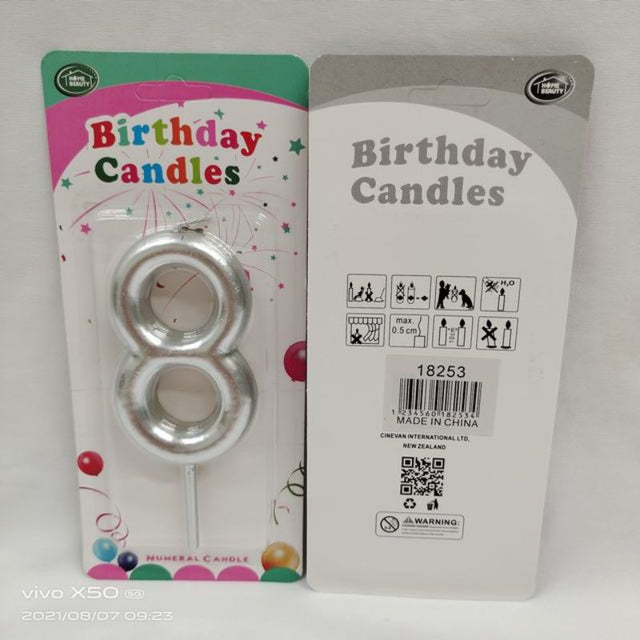 Elegant 8-inch silver birthday candles in a set of 12, perfect for enhancing cake aesthetics at any celebration.