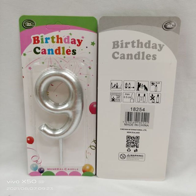 Set of 12 elegant silver birthday candles, 9 cm long, perfect for cakes, creating a magical and stylish celebration atmosphere.