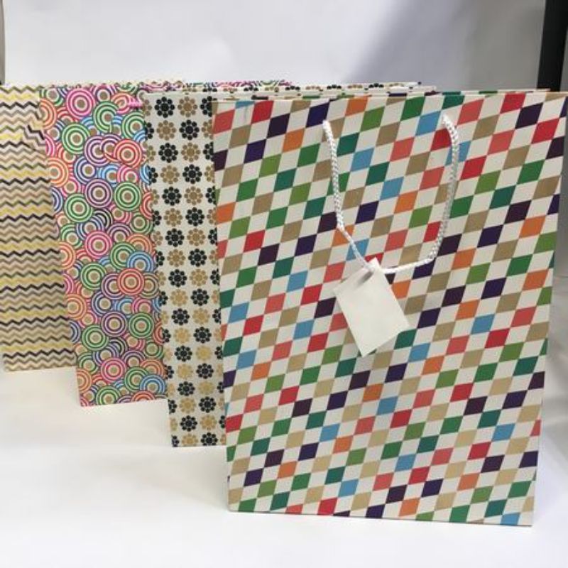 Vibrant 42cm gift bags (12pcs) with unique shapes, perfect for birthdays and holidays, durable and stylish for all occasions.