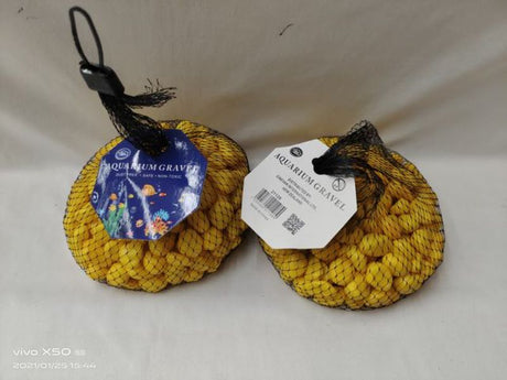 Vibrant yellow aquarium stones in 700g packs, perfect for enhancing aquatic landscapes and habitats.