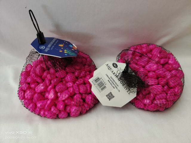 Vibrant pink aquarium stones in 500g packs, enhancing underwater habitats and safe for all aquatic environments.