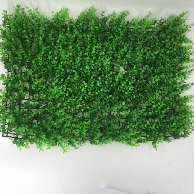 Lush green artificial lawn pieces (60cm, set of 12) for indoor/outdoor decor, easy to install with low maintenance.