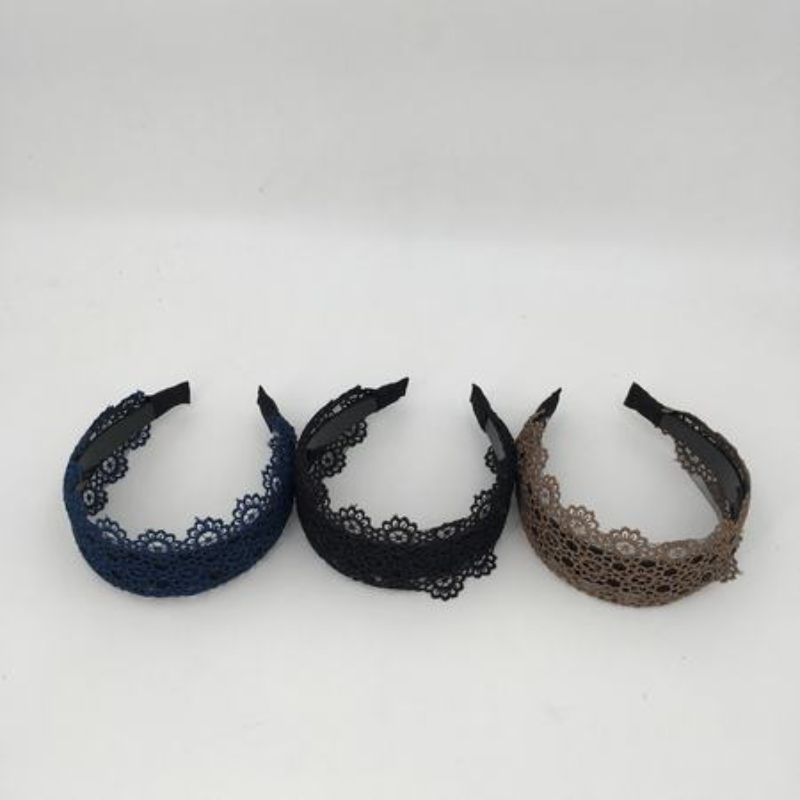 Set of 12 assorted hair bands in various colors, ideal for versatile styles without damaging hair. Perfect for all hair types.