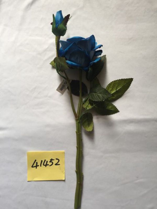 Set of 12 artificial blue roses with lifelike petals, perfect for elegant home decor and maintenance-free arrangements.