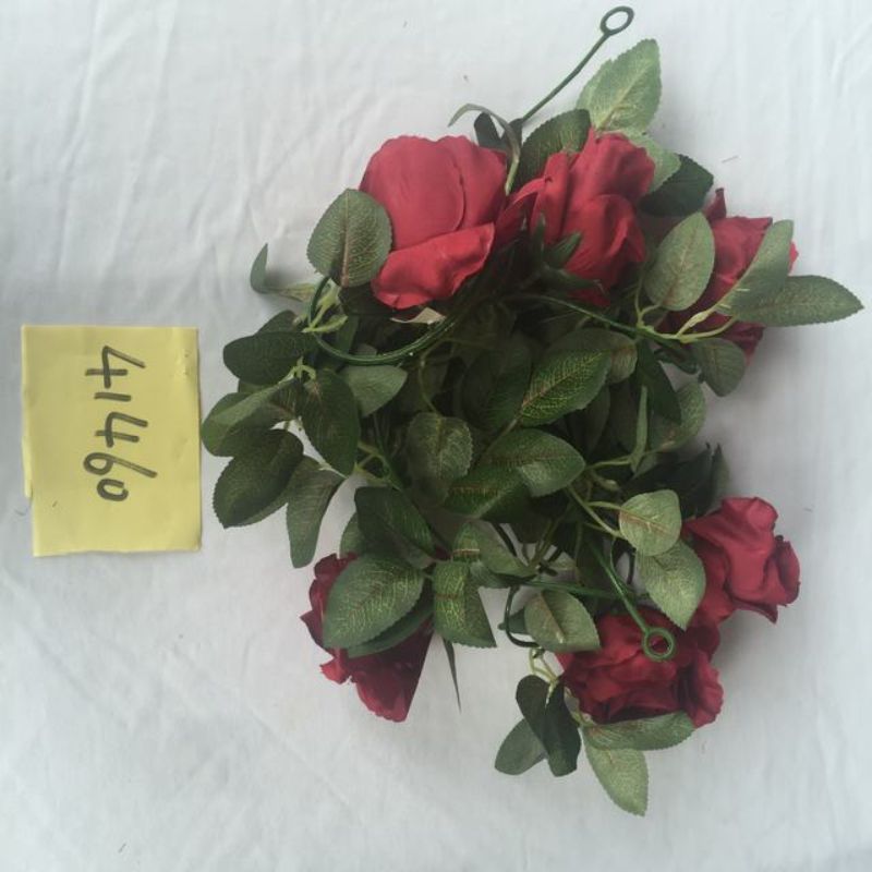 Set of 12 vibrant scarlet artificial flowers, perfect for decorations and creating striking floral arrangements.