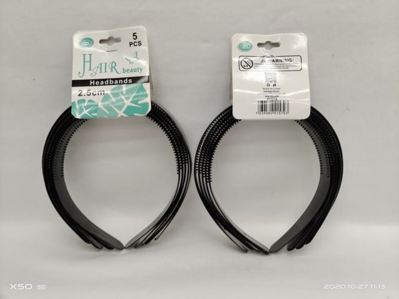 Pack of 60 black hair bands, 2.5cm each, durable and stretchy for secure, damage-free styling for all hair types.