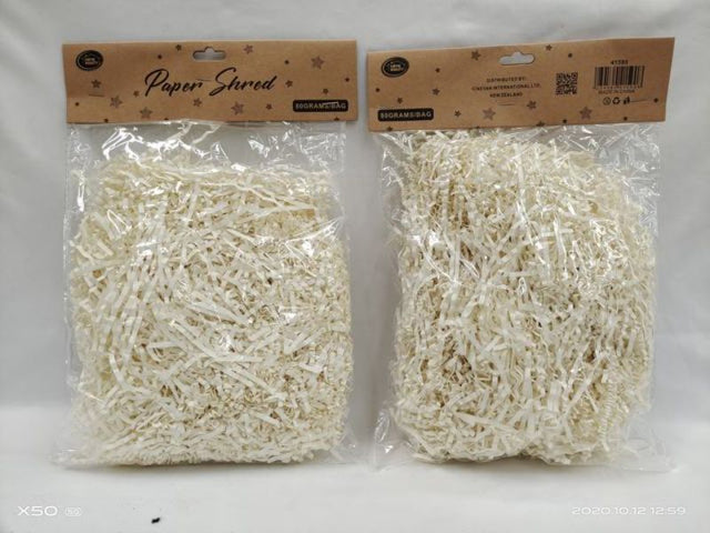 Cream paper shred, 80g per pack, ideal for gift baskets and crafts; adds elegance to decorations and is eco-friendly.