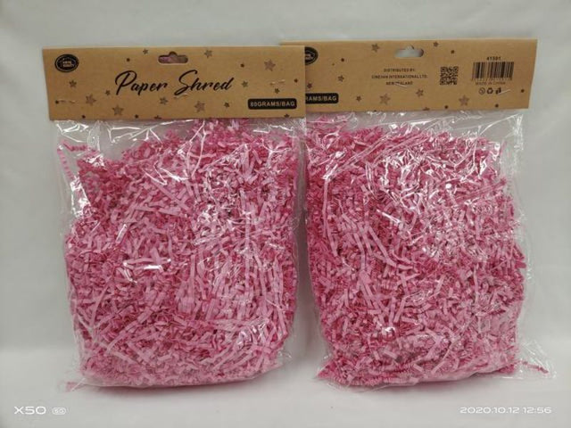 Vibrant pink shredded paper in 80g packs, perfect for gift wrapping, crafting, and eco-friendly decor. Set of 12.