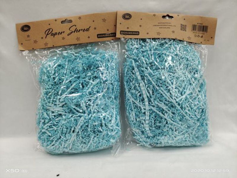 Vibrant blue paper shred in 80g packs, perfect for crafting, gift baskets, and eco-friendly decorations.