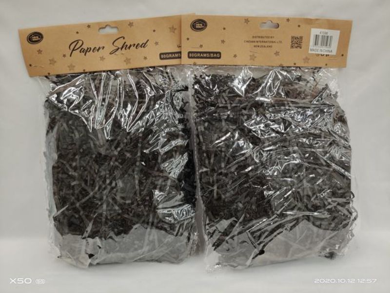 Premium black paper shred, 80g, ideal for crafting, gift baskets, and document disposal, available in 12 economical packs.