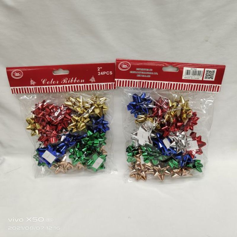 Twelve packs of festive Christmas decorations, featuring 24 exquisite pieces for trees, mantels, and tables.