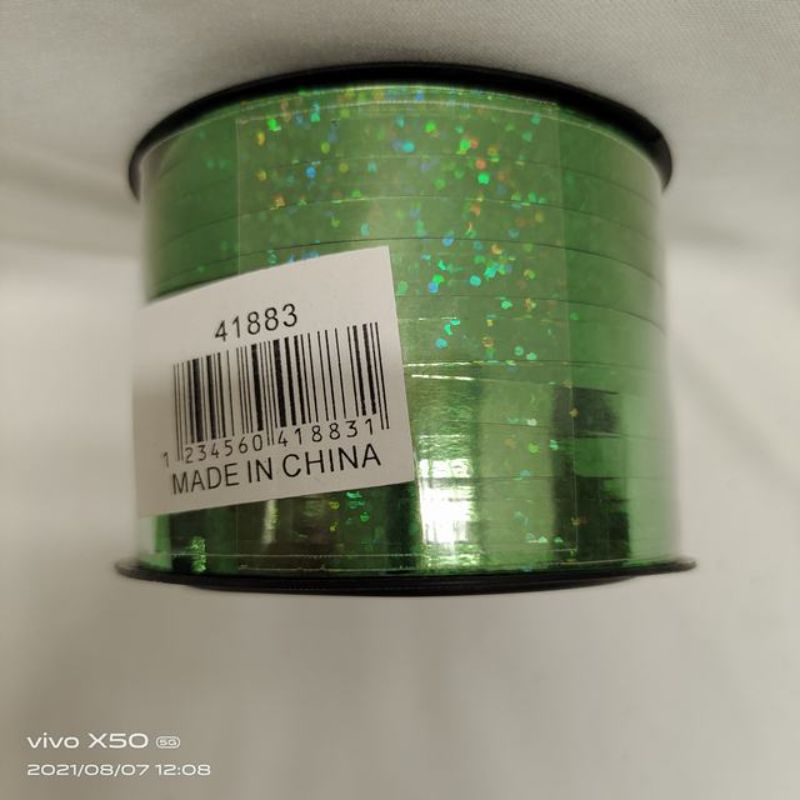 Set of 12 vibrant green ribbon rolls, each 0.5cm wide, perfect for gift wrapping and DIY crafting projects.