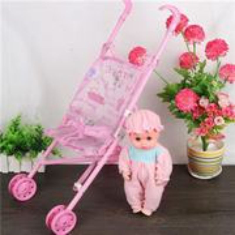 Pink baby trolley featuring an adjustable canopy, spacious storage basket, and ergonomic handle for stylish, comfortable outings.