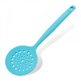 Light blue Tasty Silicone Skimmer with ergonomic handle, strategic holes for draining, and heat resistance up to +230°C.