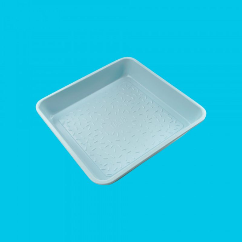 Light blue Tasty Brownie Pan with non-stick coating for easy release, ideal for baking fudgy brownies and desserts up to 230°C.