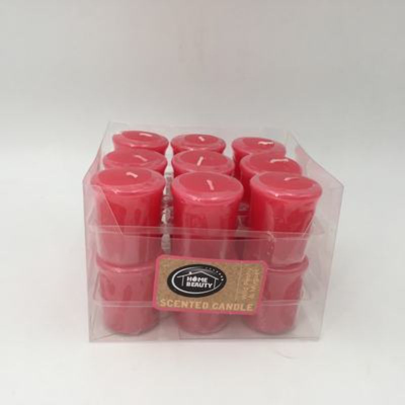 Set of 18 hot pink votive candles with wild peony and muguet fragrance, ideal for creating a warm ambiance.