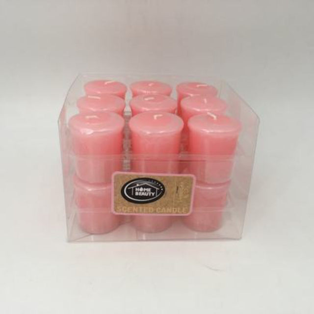 Set of 18 votive candles in Pink Sweetpea & Lily, offering a soothing glow and floral fragrance for any occasion.