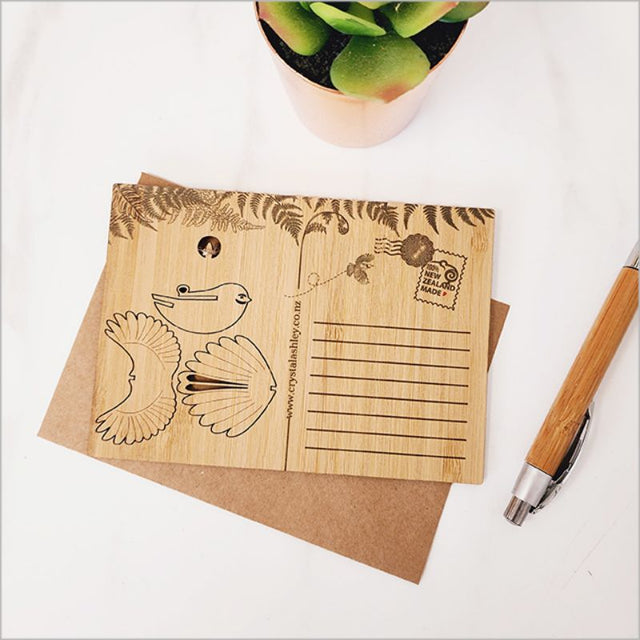 Eco-friendly bamboo postcard featuring a detachable Fantail 3D ornament, ideal for personalized greetings or decor.