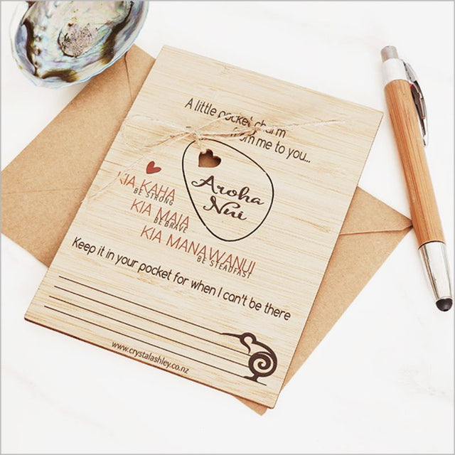 Eco-friendly bamboo postcard featuring Kia Kaha motif, perfect for messages and decorative use, crafted in New Zealand.