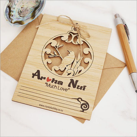 Eco-friendly bamboo postcard featuring Tui design, ideal for messages and decor, includes jute string and craft envelope.