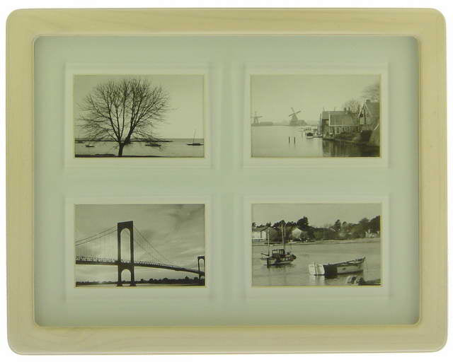 White wash 4-opening photo frame, perfect for displaying cherished memories in any interior style.