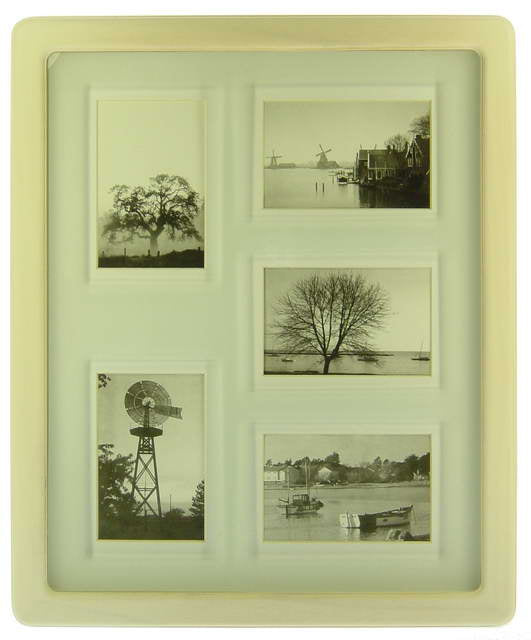 Elegant white wash photo frame featuring five openings for showcasing cherished memories in a stylish collage.